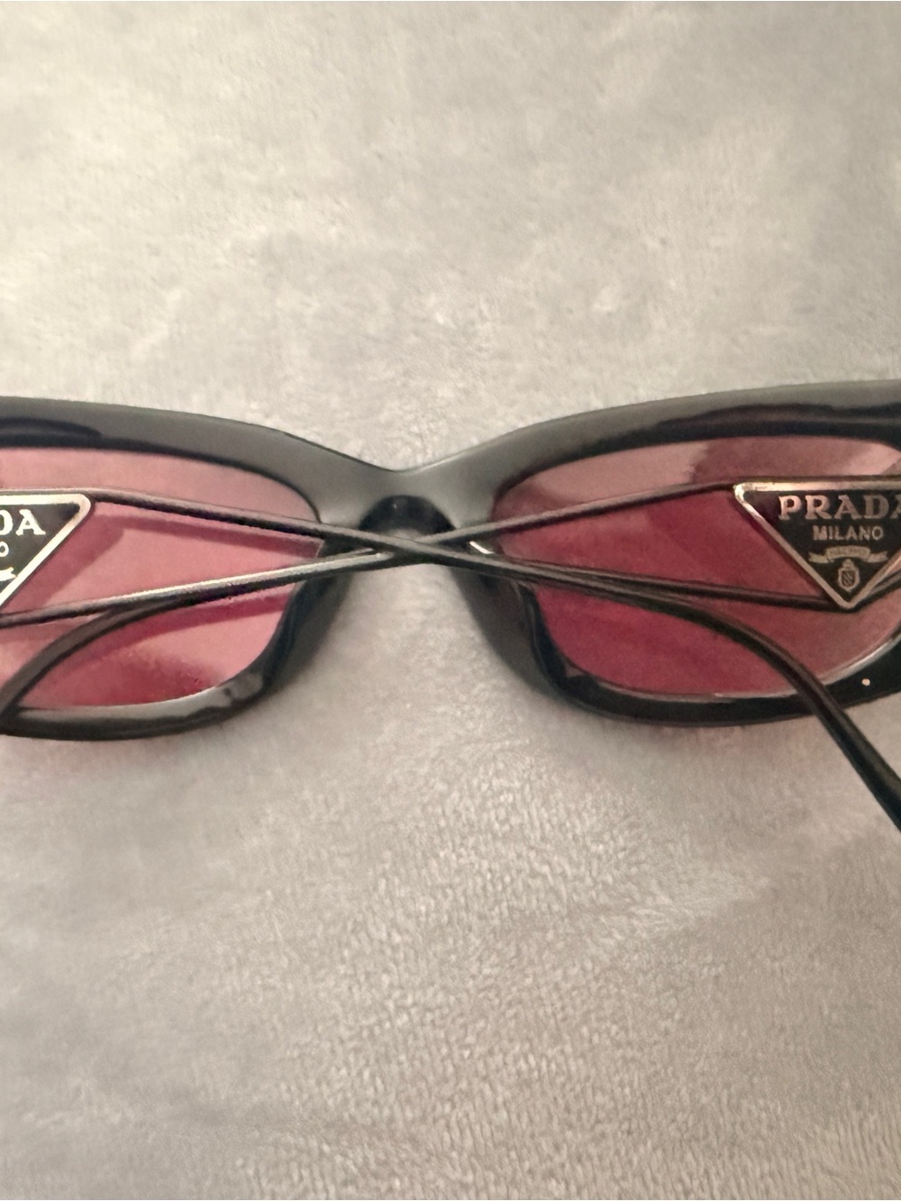 Prada Black Frame Sunglasses with Pink Lenses